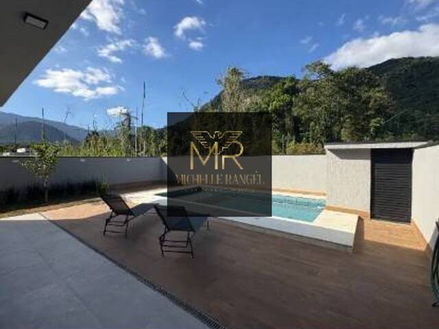 #566 - Casa em condomínio para Venda em Caraguatatuba - SP