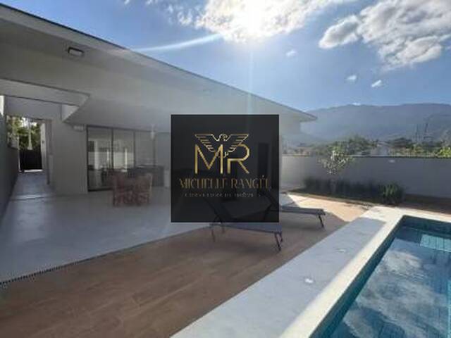 #566 - Casa em condomínio para Venda em Caraguatatuba - SP